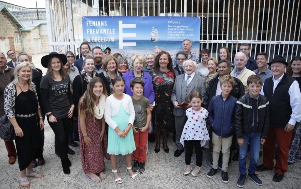 Hon. Michael D. Higgins, President of Ireland (3-piece gray suit) and our Asst Coordinatorfor DNA, Aidan Kelly, peering out from the back row with planning group for Fenians Fremantle & Freedom Festival for 5–14 January 2018 in Fremantle, Western Australia.